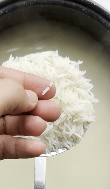 picture of afghan white basmati rice being cooked to perfection